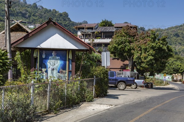 Photo of recent kink in shrine near the entrance to Doi Pha Mee in the hills of the Mae Sai district of Chiang Rai, Thailand