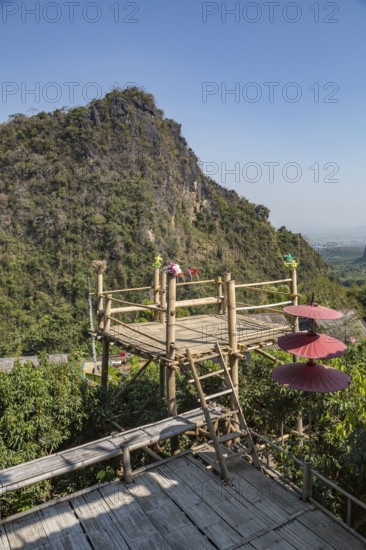 Bamboo overlook platform provides unobstructed view of the hillside at Pha Mi Village in Mae Sai district of Chiang Rai, Thailand