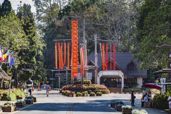 Lanna flags display celebrates cultural history inside the Doi Tung tourist attraction in Chiang Rai, Thailand