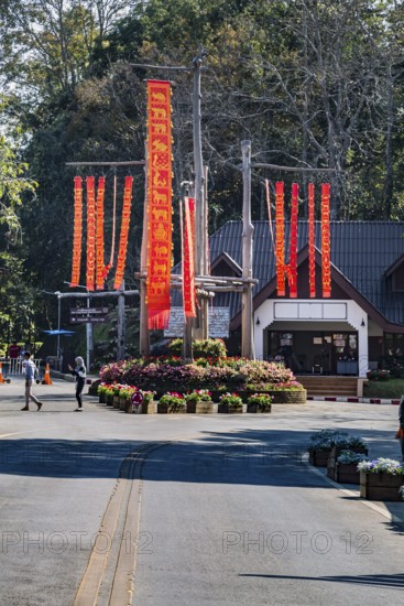 Lanna flags display celebrates cultural history inside the Doi Tung tourist attraction in Chiang Rai, Thailand