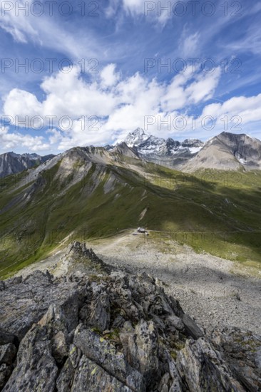 Summit of Kastenegg, view of picturesque mountain landscape with snow-covered summit of the Großglockner, Vienna High Trail, Schober Group, Hohe Tauern National Park, Carinthia, Austria