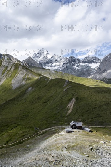 Glorerhütte mountain hut, view of picturesque mountain landscape with snow-covered summit of the Großglockner, Vienna High Mountain Trail, Schober Group, Hohe Tauern National Park, Carinthia, Austria