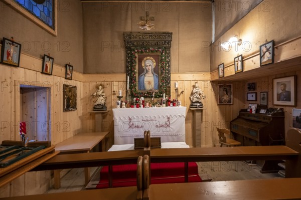 Interior view, small chapel with altar and image of the Virgin Mary, Maria im Schnee chapel, at the summit of the Becher, Stubai Alps, South Tyrol, Italy