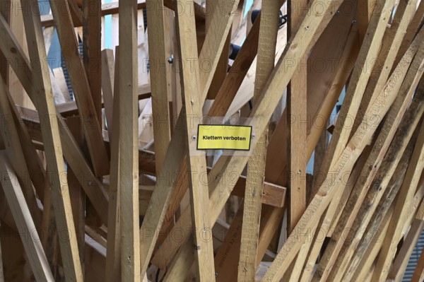 No climbing - sign in an outdoor exhibition at the Futurium on the subject of agriculture and cultivation