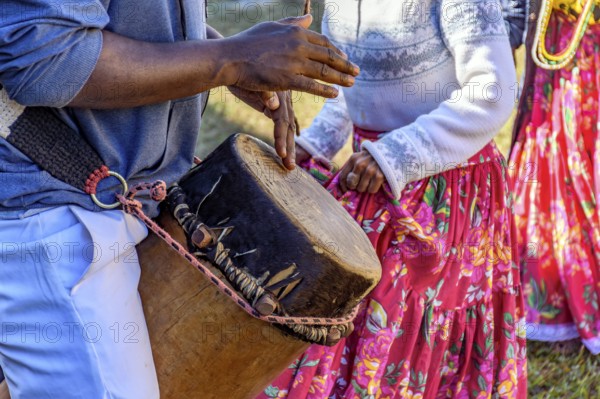 Rustic atabaque of African origin played in a presentation of Brazilian popular culture