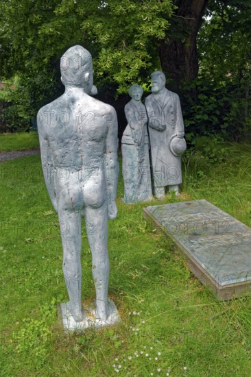 The philosopher Nietzsche as a dream image and Friedrich Nietzsche on his mother's arm at his grave, sculptures Röckener Bacchanal by Klaus F. Messerschmidt, Röcken, town of Lützen, Saxony-Anhalt, Germany