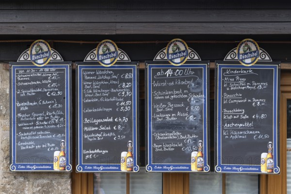 Food offers written on blackboards in front of a restaurant, Bavaria, Germany
