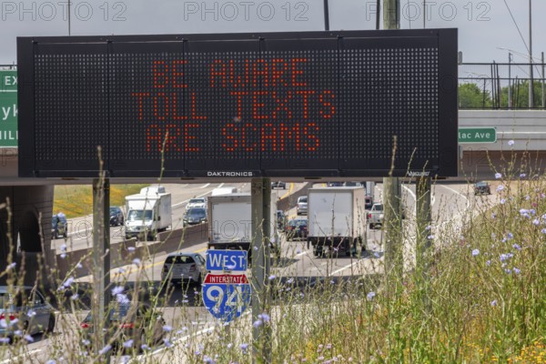 Detroit, Michigan - A message on an electronic road sign on Interstate 94 warns drivers about common scams that demand payment for using toll roads
