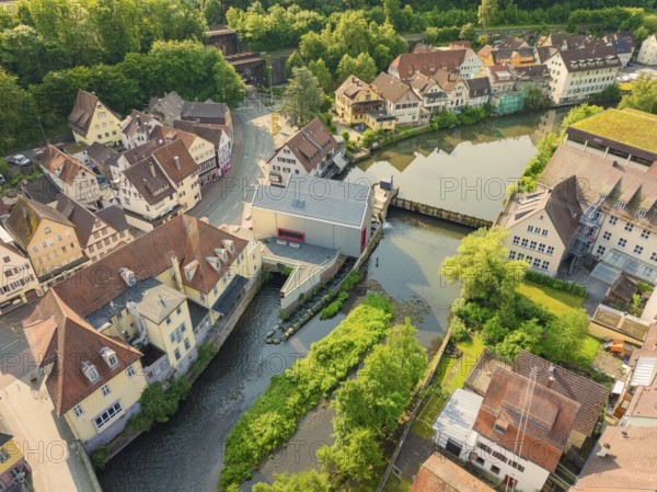 A quiet urban landscape with a river and surrounding nature, Calw, Black Forest, Germany