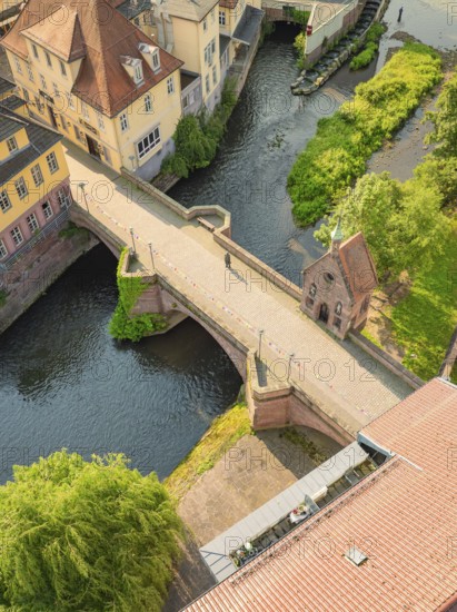A historic bridge over a quiet river in a picturesque town, Calw, Black Forest, Germany