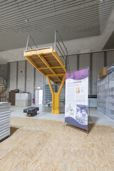 Industrial steel construction with railings and information poster, historical art exhibition in the old swimming pool, show depot, Calw, Black Forest, Germany