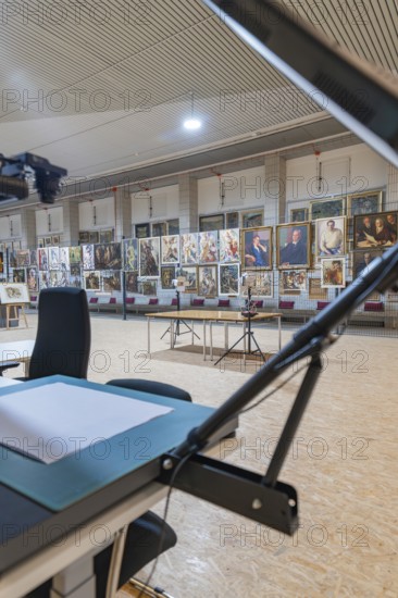 Exhibition gallery with artworks, stands and tables in the interior, historical art exhibition in the old swimming pool, show depot, Calw, Black Forest, Germany