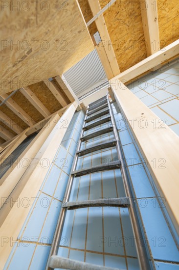 View upwards along a ladder in a room with blue tiles, historical art exhibition in the old swimming pool, Schaudepot, Calw, Black Forest, Germany