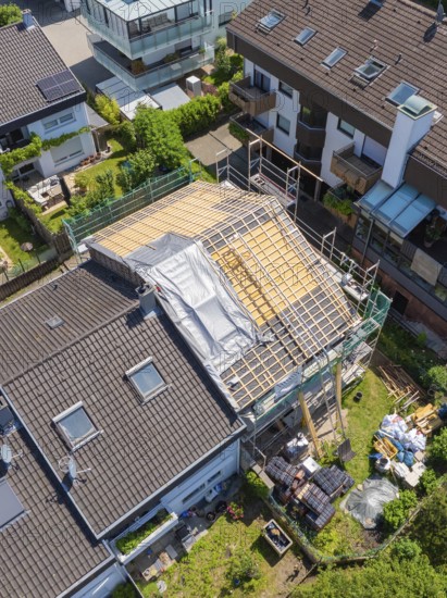 Aerial view of a house with roof under construction in suburban location, roof renovation, house construction, Pforzheim, Germany