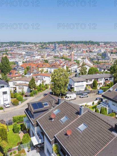View of a residential area with tiled roofs and neighbouring urban skyline, roof renovation, house construction, Pforzheim, Germany