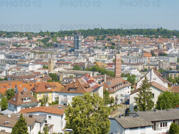 Bird's eye view of a town with various tiled roofs and a church tower, roof renovation, house construction, Pforzheim, Germany