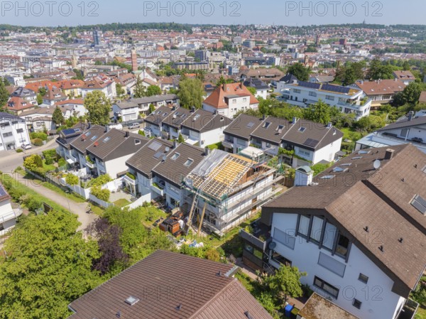 City view with focus on a renovated house roof in a residential area, roof renovation, house construction, Pforzheim, Germany