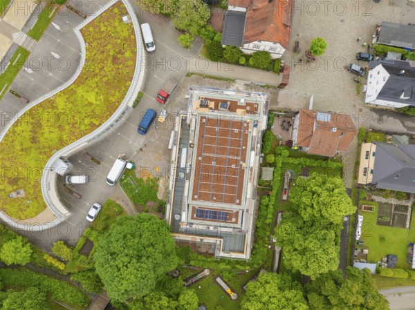 Bird's eye view of building with roof, surrounded by trees and construction site activities, Hirsau, Calw, Germany