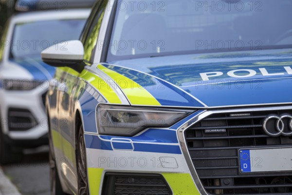 Symbolic image police operation: close-up of police emergency vehicles