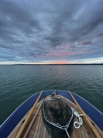 Evening mood, view from a rowing boat, Lake Starnberg, Bavaria, Germany