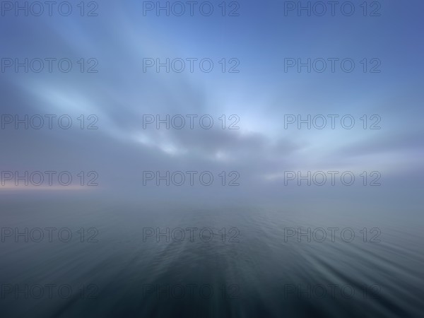 Fog over Lake Starnberg, zoom effect, Bavaria, Germany