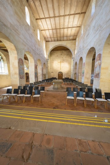 Church interior with organised pews and a central cross, event and wedding location Lorch Monastery, Lorch, Germany