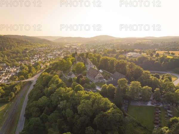 Sweeping views of a village and landscape at sunset, event and wedding location Lorch Monastery, Lorch, Germany