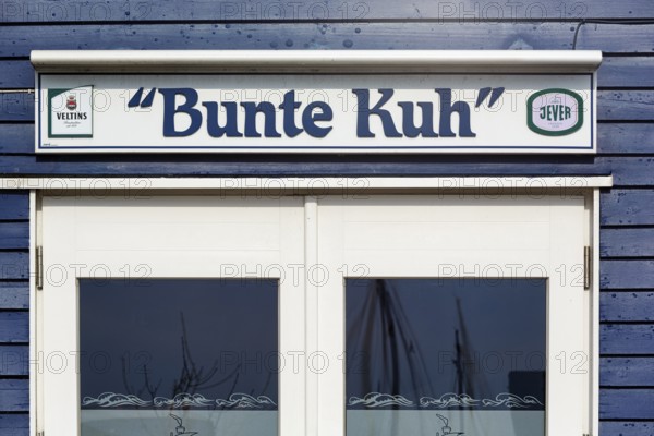 Blue lobster shack, wooden façade with window, rustic fish restaurant, façade detail in the harbour, Heligoland, Schleswig-Holstein, Germany