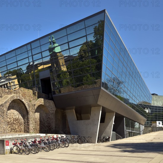 West side of the Darmstadtium congress centre with historic city wall in the centre of Darmstadt, Hesse, Germany
