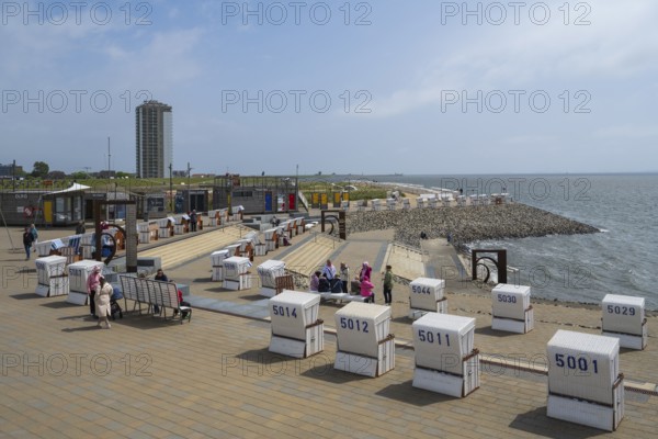 Beach chairs on the promenade, people, elevated position, family lagoon, Perlebucht, Büsum, North Sea, Schleswig-Holstein, Germany