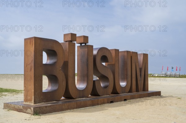 Font with capital letters BÜSUM, sign on the beach, Büsum, North Sea, Schleswig-Holstein, Germany