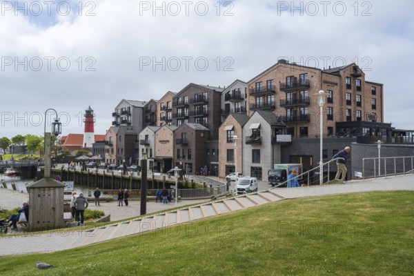 Hotel and apartment building, lighthouse, Am Hafen, Büsum, North Sea, Schleswig-Holstein, Germany