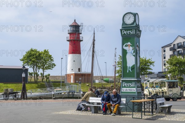 Persil clock at the anchorage, behind the lighthouse, Büsum, North Sea, Schleswig-Holstein, Germany