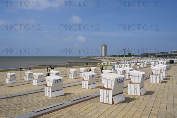 Beach chairs on paved coast, promenade, Büsum, North Sea, Schleswig-Holstein, Germany