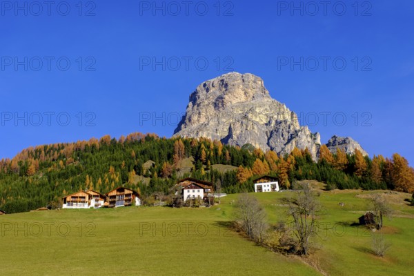 Farmhouses under the Sassongher, near Colfosco, Alta Badia, Val Badia, Dolomites, South Tyrol, Italy