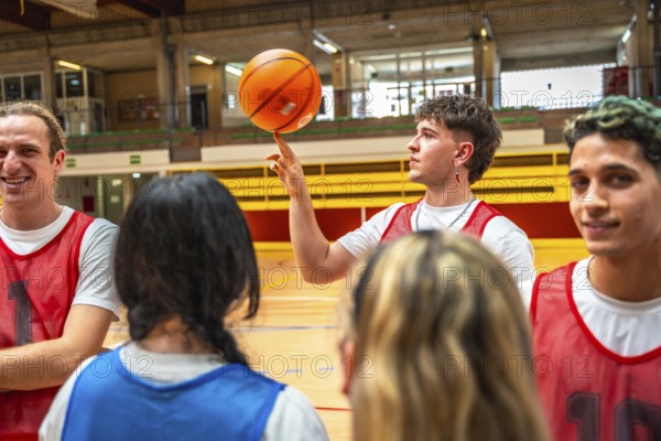 Young basketball player spinning ball on finger, surrounded by teammates in gym, showcasing skill and coordination
