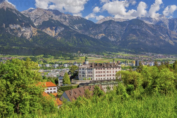 Ambras Castle on the outskirts of the city in front of the northern range of the Karwendel mountains, Innsbruck, Inntal, Tyrolean Alps, Tyrol, Austria