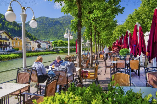Café terrace of the GranCafe Zauner on the banks of the Traun, Bad Ischl, Trauntal, Salzkammergut, Upper Austria, Austria