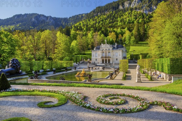 Water parterre with the portal of Linderhof Castle in spring, municipality of Ettal, Ammergau Alps, Ammertal, Upper Bavaria, Bavaria, Germany