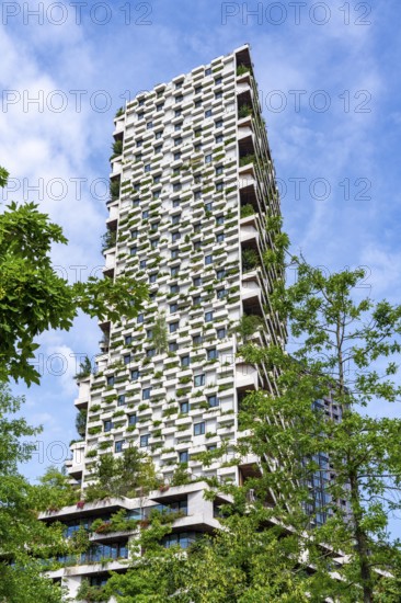 Wonderwoods residential tower, one of 2 green buildings, in Utrecht in the new Healthy Urban Quarter, at the central station, 105 metres high with 30 floors, Tower II, over 360 trees and over 9600 shrubs and flowering plants native to the region, all irrigated with collected rainwater, sponge city principle and monitored with sensors, Utrecht, Netherlands