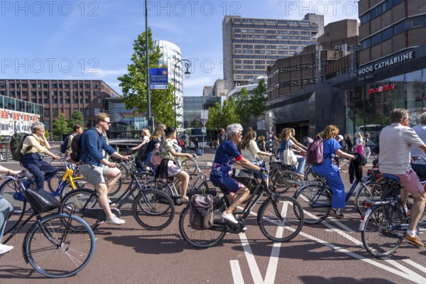 Central cycle path on the Lange Viestraat, lanes for pedestrians, cyclists and local traffic are separated in the city centre, dense traffic, no car/truck traffic, Utrecht, Netherlands