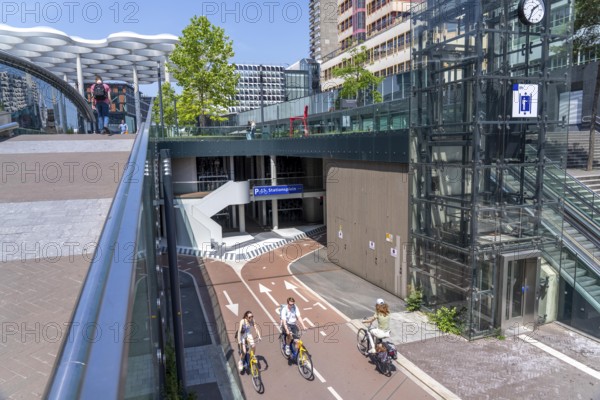 Entrance and exit to the central bicycle car park at Stationsplein, the largest bicycle car park in the world with over 13, 000 parking spaces on 3 floors, directly under the central station, Utrecht Centraal, Netherlands