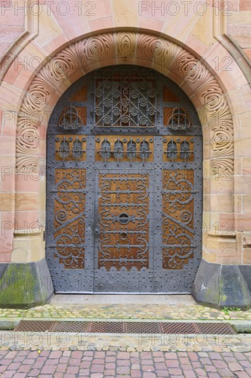Archbishop's Ordinariate door, ornate historic door under an embossed round arch, Freiburg im Breisgau, Black Forest, Baden-Württemberg, Germany