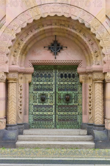 Entrance to the Archbishop's Ordinariate of Freiburg, historic ornate door under a decorative round arch, Freiburg im Breisgau, Black Forest, Baden-Württemberg, Germany