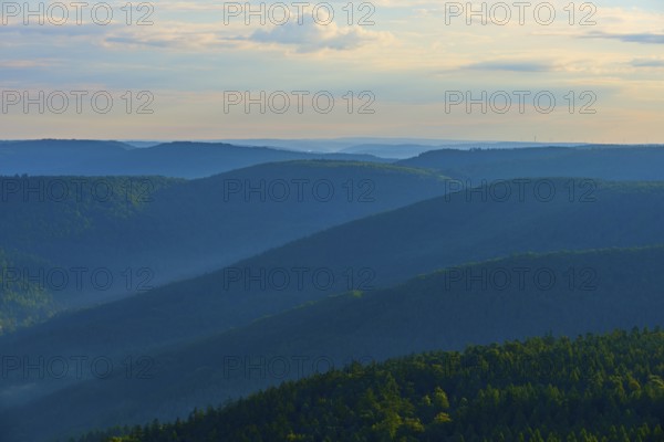 Wide mountain range at dusk, slightly illuminated sky and quiet forest, Katzenbuckel, Waldbrunn, Neckar-Odenwald-Kreis, Odenwald, Baden-Württemberg, Germany