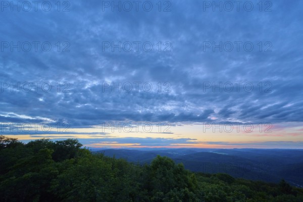 Dark blue sky towards the end of the sunset over a wooded region, Katzenbuckel, Waldbrunn, Neckar-Odenwald-Kreis, Odenwald, Baden-Württemberg, Germany