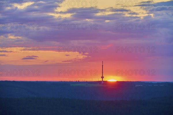 Colourful sunrise with silhouette of a transmitter mast, transmitter Reisenbach, at dusk, seen from Katzenbuckel, Reisenbach, Mudau, Neckar-Odenwald-Kreis, Odenwald, Baden-Württemberg, Germany