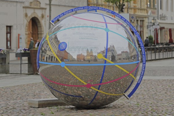 Metal ball with reflection and inscription Note to link digital mobile device, smartphone, stainless steel, circles, lines, shiny, tourism, information, market square, Luther city Wittenberg, Fläming, Saxony-Anhalt, Germany