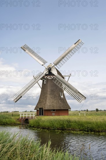 Krimstermolen on the Boterdiep canal, Poldermühle, Zuidwolde, province of Groningen, Netherlands