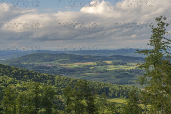 GEO nature park Park Frau Holle Land am Meissner, view from the coal road into the Berka valley, agriculture, fields, forests, village, fir trees, low mountain range, legendary figure, home of the fairy tale, blue sky, clouds, district of Kassel, Fulda Werra Bergland, Germany